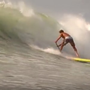 Laird Hamilton SUP trick