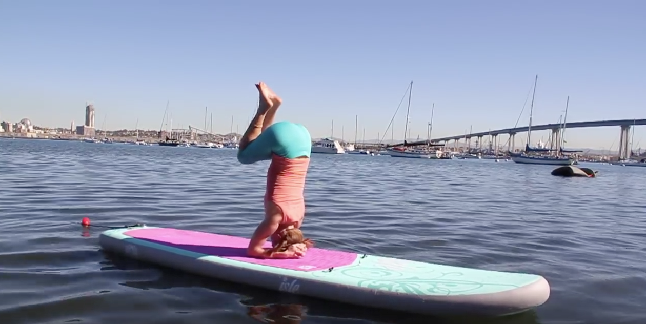 10 Yoga Positions On A Stand Up Paddle Board Sup World Mag