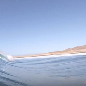 This Woman Loves to SUP Huge Waves over Sharp Reefs