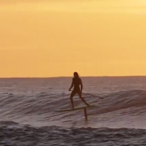 SUP foil surfing dawn patrol