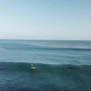 Laird Hamilton paddling into a 1 minute ride on his Hydrofoil SUP in Malibu