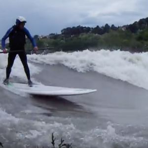 Sup Surfing Huge River Wave