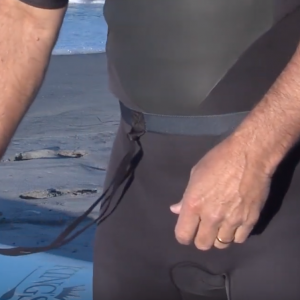 Using the Paddle Belt to paddle hands-free through breaking surf