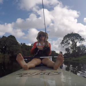 Lady Lands Solid Bass on a Sup Board.
