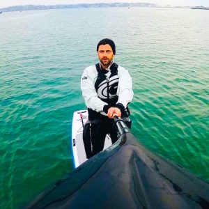 david haze paddle boarding on a lake