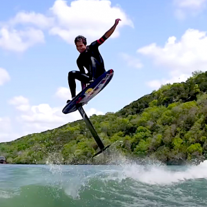 kai lenny wake foiling in a river