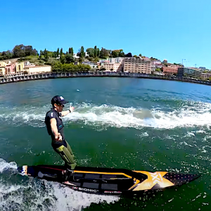 Watch SUP boarder Bruno Hasulyo surfing the wake of a boat down a river in Portugal, there isn't really the need for a paddle in this case, amazing!
