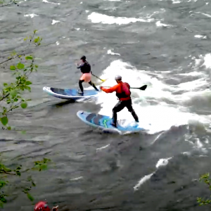 Follow Paul Clark, Alan Pace and Katelyn Kazen riding out this epic river wave on their boards!