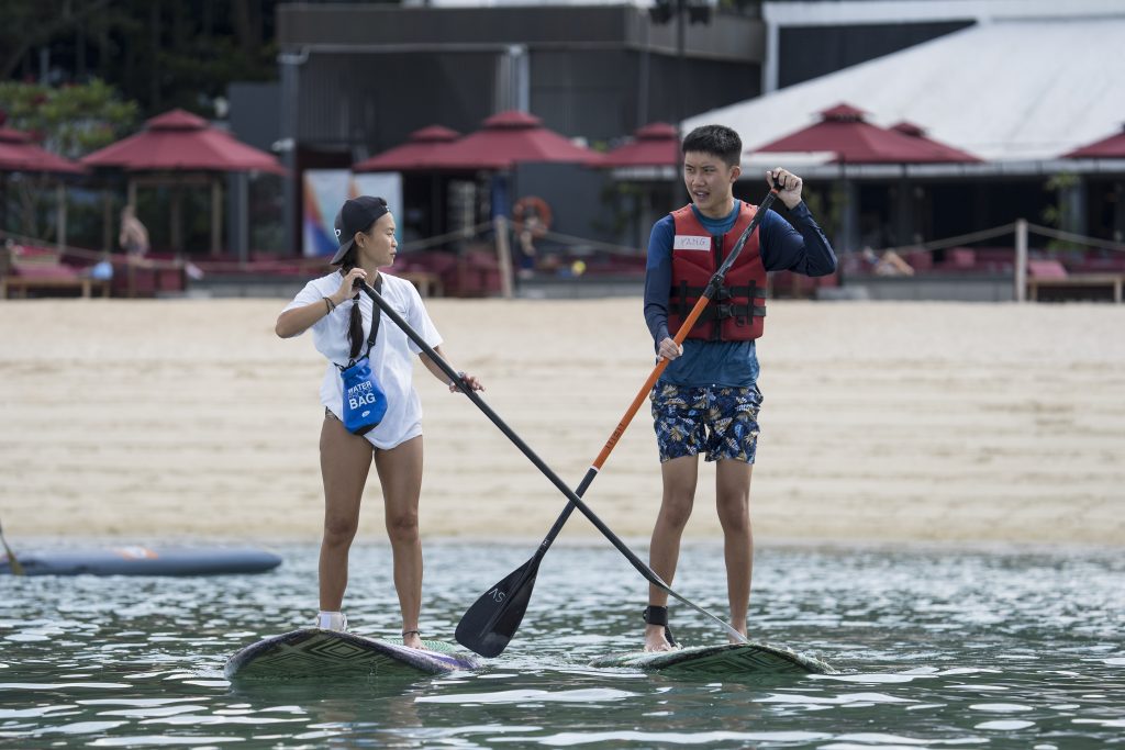 One of POT’s head coaches, Gracie Teo, and POT’s regular
paddler with autism, Yang, en route to conquer the 5km
community paddle.